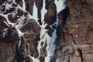 Climber doing ice climbing in Bodo, Nordland, Norway Climber doing ice climbing in Bodo, Nordland, Norway